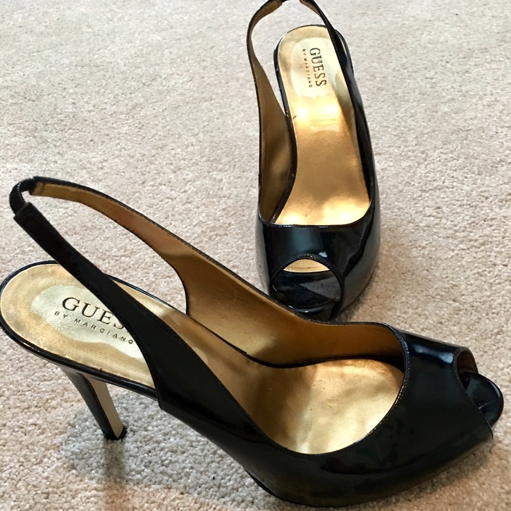 Guess black patent pumps